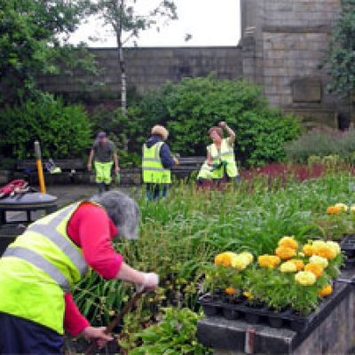 Volunteers looking after a local green space