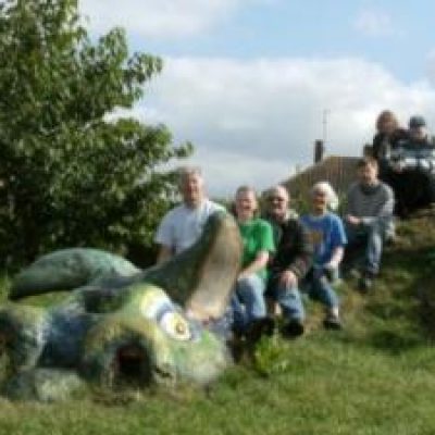 Milton Keynes Green Gym and Wolverton Community Orchard Group volunteers on top of the ‘dragon mountain’
