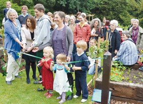 People at the opening of a garden