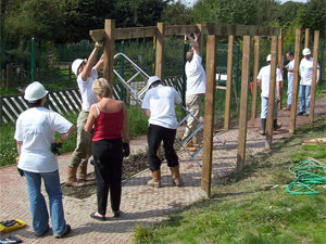 Employees building a walkway