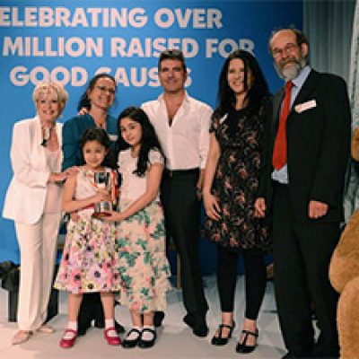 Simon Cowell celebrating good causes