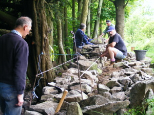 Volunteers dry stone walling