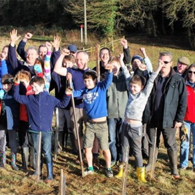 A happy group of tree planters