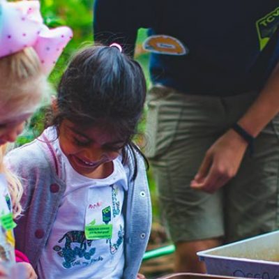 Children enjoying pond-dipping at a TCV event