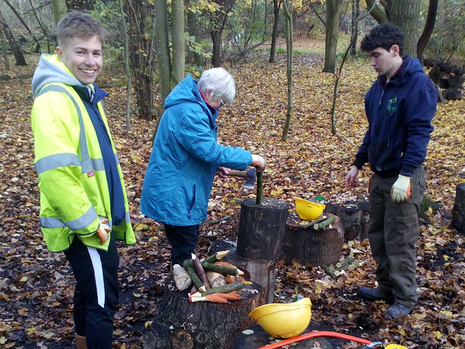 People working in woodland at Skelton Grange