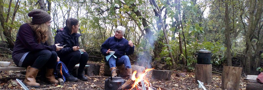 Skelton Grange Green Gym members cooking in the woods