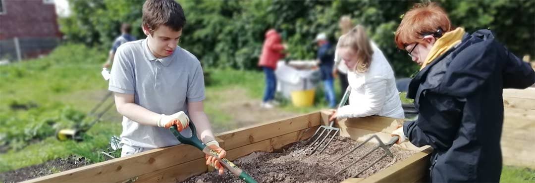 Children working in a garden