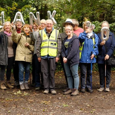 Group of volunteers celebrating People's Postcode Lottery Volunteer of the Year