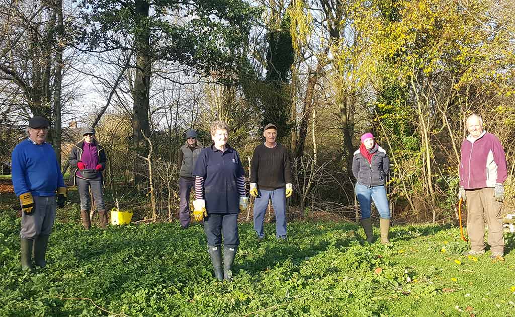 People in a meadow at St Clements Common, Rushall