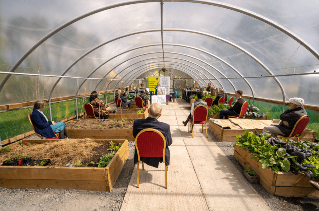 QAVS Belfast celebration event in polytunnel with Lord Lieutenant