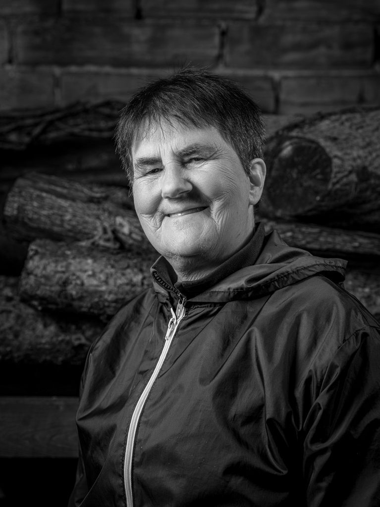 Black and white portrait image of an older lady with short hair. Credit Mark Slater, TCV