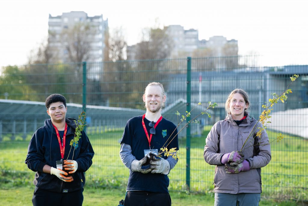 Volunteers and staff planting trees with TCV