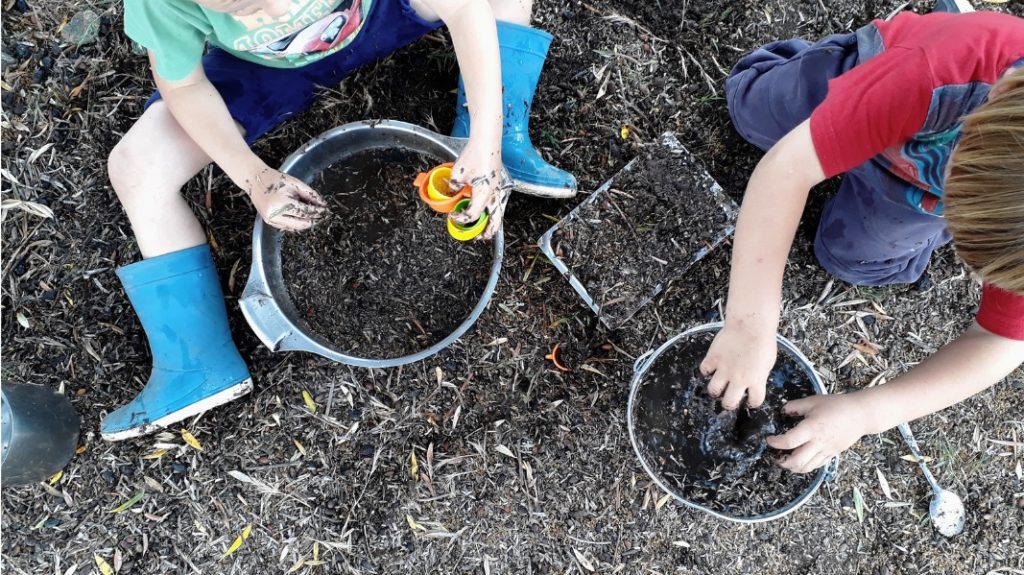 Kids mud hands