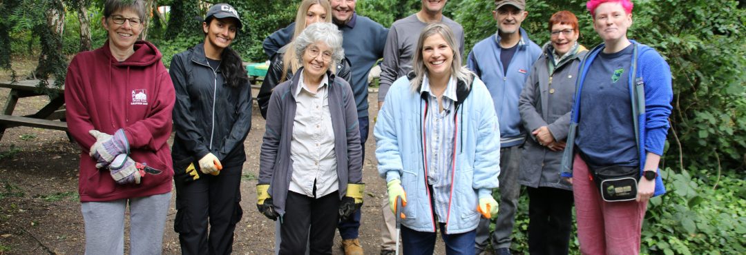 Pips Taylor and volunteers licking picking at TCV Railway Fields