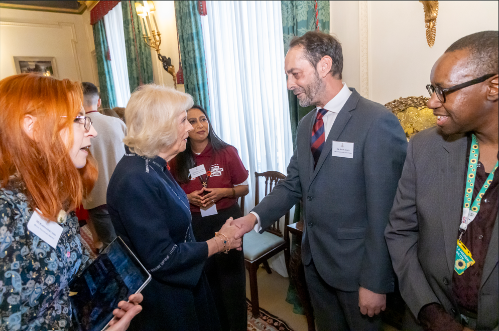 TCV staff and volunteers meeting HM Queen Camilla