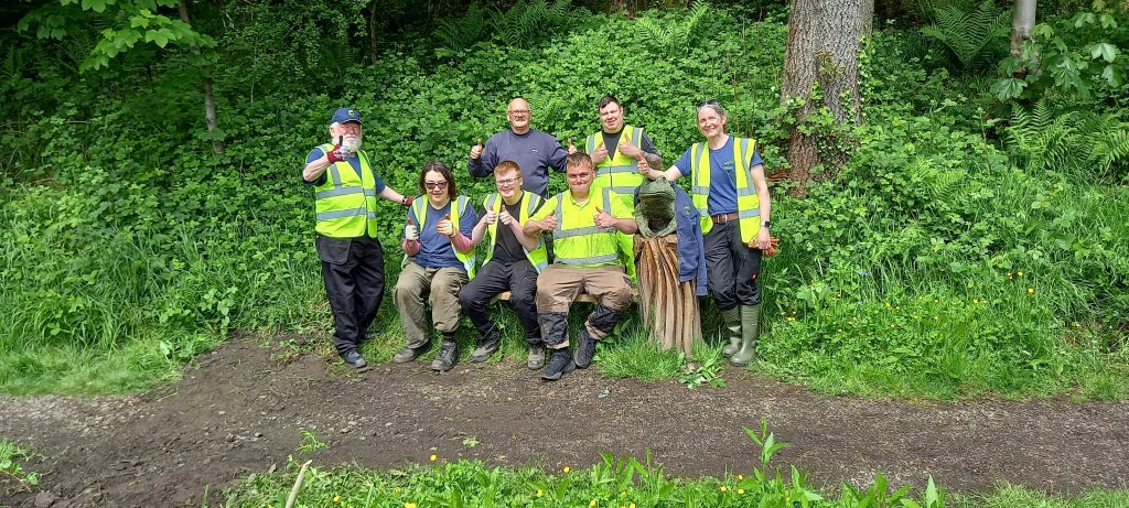 Group of TCV volunteers in a woodland