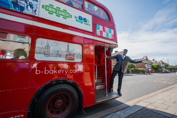 Ainsley Harriot on a bus for The Big Help Out
