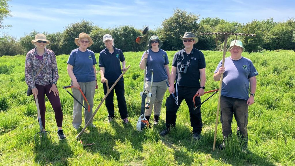 Group of TCV nature volunteers in a field