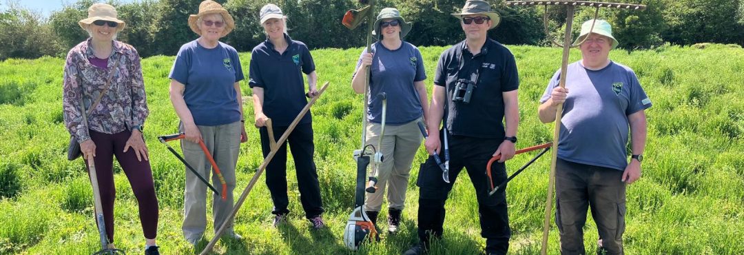 Group of TCV nature volunteers in a field