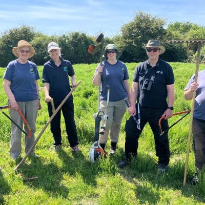 Group of TCV nature volunteers in a field